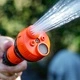 Маркуч спираловиден 15 м с връзки и струйник 4 функции к-т