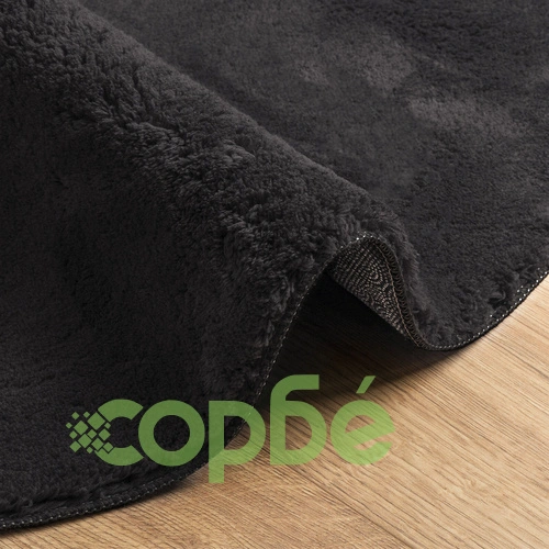 Черен кръгъл килим от полиестер 140 x 200 см с неплъзгаща основа ➤ топ цена ➤ sorbe.bg