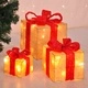 HI Коледни подаръци с червени панделки, 3 бр, LED осветление